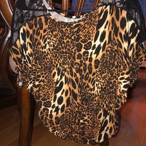 Cheetah Short Sleeve Top w/ Black Lace Sleeves. Brand: Body Central Size: Medium
